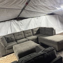 Grey couch with ottoman good condition clean we sell all the time delivery $40 local