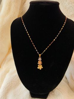Cadena y dije Flor Hawaiiana 14KT