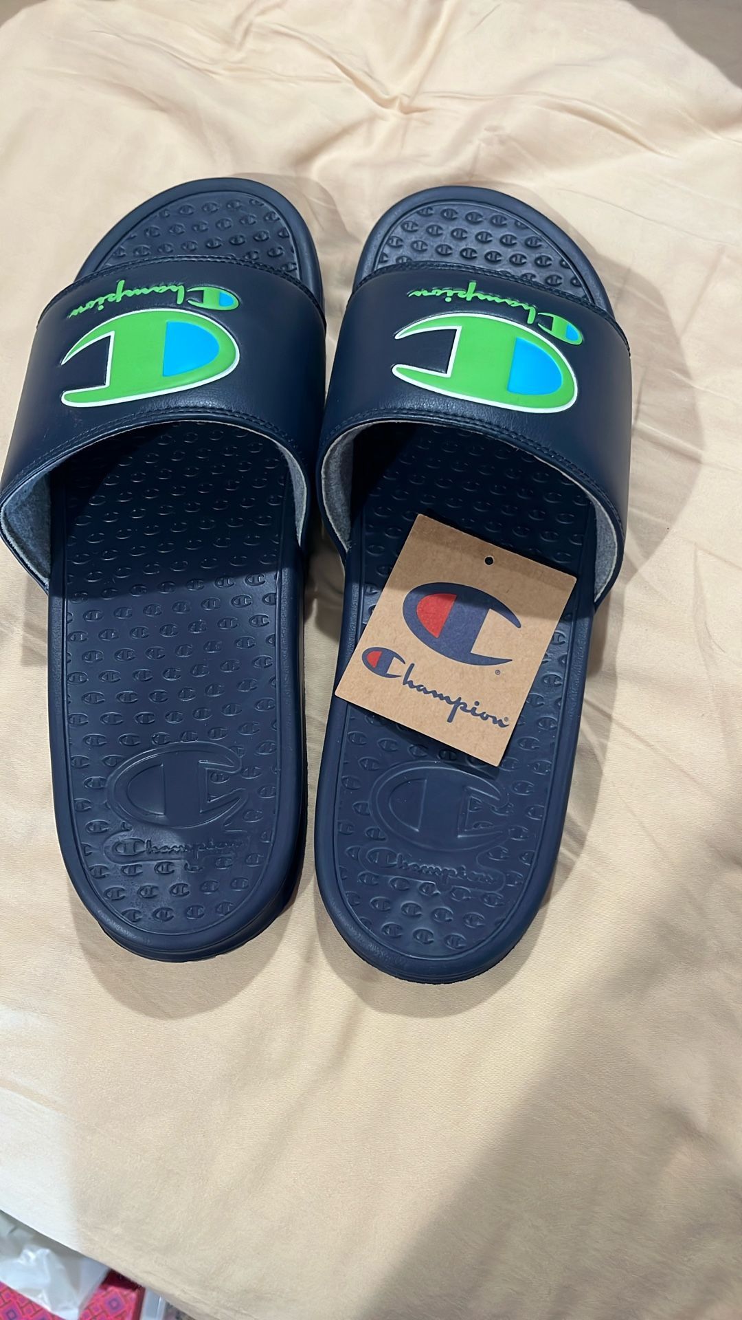 Men’s Super Slide Champion Sandal, $19