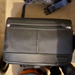 Nikon camera shoulder bag in great condition. Perfect for carrying a DSLR or mirrorless camera, lenses, and accessories.  Interior is fully padded wit