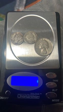 Silver quarter and barber silver dime