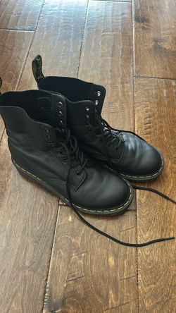Dr. Martens High Top Boots.