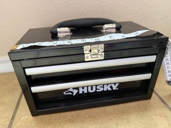Husky tool box with some tools