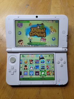Nintendo 3DS XL, with over 300 games. Ideal condition