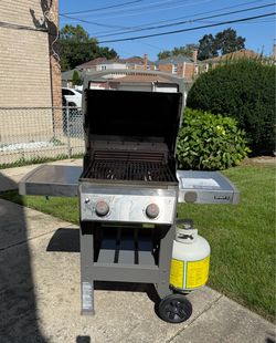 Weber Spirit II 2-Burner Gas Grill, propane tank and Weber grill cover included. $150.00 or best offer.