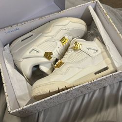 Air Jordan’s 4 Retro (white and gold) 