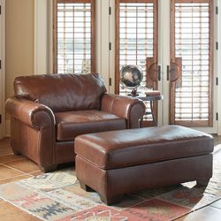 Ashley furniture oversized Faux leather Chair And Ottoman 