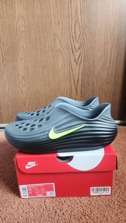 Nike size 10  Reactx rejuven8 black volt