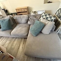 L shaped sectional with pillows