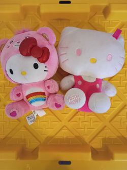 two hello kitty plushies