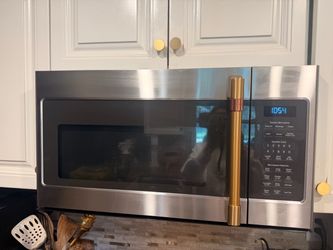 GE Cafe microwave with gold brass handle
