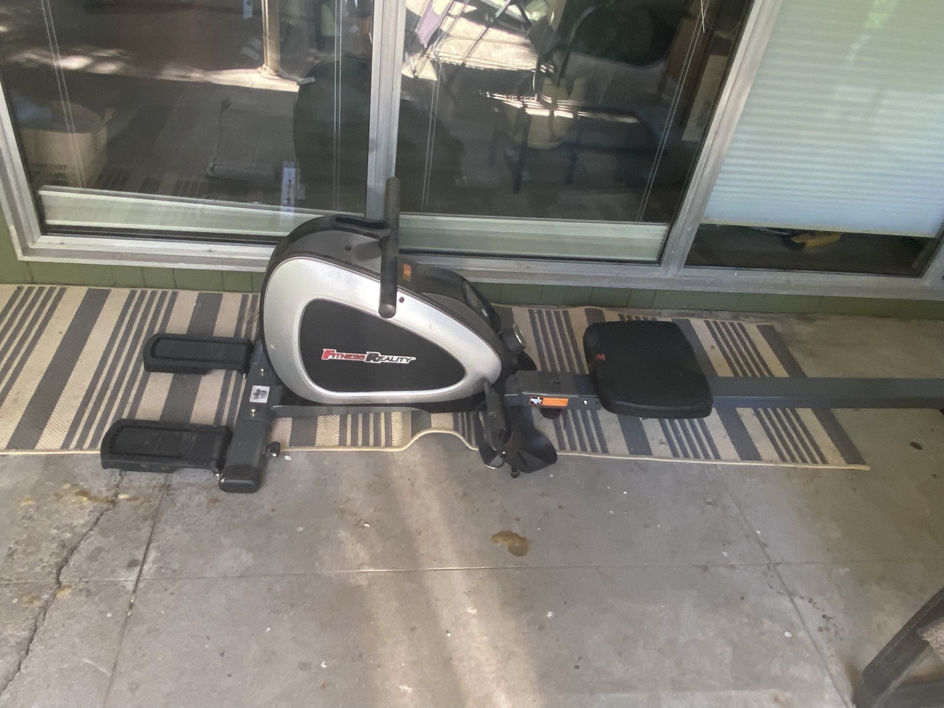 Row Machine - Fitness Reality and Bose Over Ear Headset