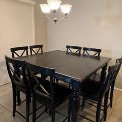 Black Counter Height Table & 8 Chairs.   54” x 54” H. 36”  