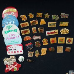 Very first California lottery pins in Spuds MacKenzie pins