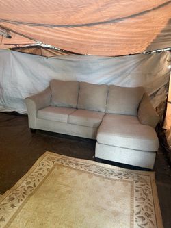 Couch with reversible chase and pullout bed, great condition, clean. We sell all the time delivery $40 local