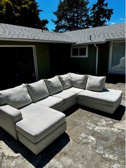 Large U-shape sectional couch - Ashley furniture