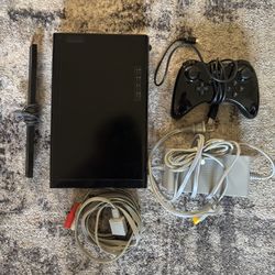 Wii U console (no gamepad) Wii U controller, games & Wii controller all black