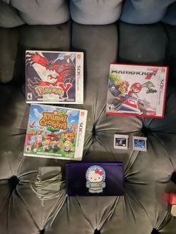 Nintendo 3ds with charger and games