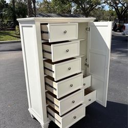 BEDROOM ARMORIE WITH 8 DRAWERS AND 3 SHELVES WHITE COLOR IN EXCELLENT CONDITION BY COASTER FURNITURE