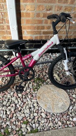 Pink/white Diamondback bike