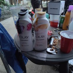 4 brand new bottles of olive of olay 22fl. oz
