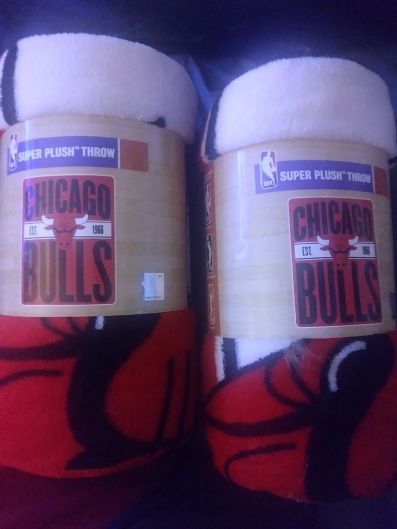 2 Brand new Chicago Bulls super plush throw. (NEED GONE) $25 EACH OBO