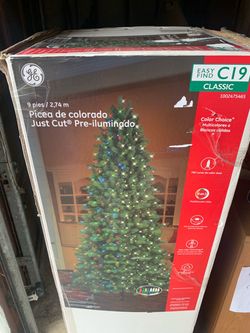 Premium GE 9-foot Just Cut Colorado Spruce pre-lit artificial Christmas tree.