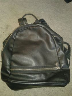 Almost new all black leather Neff backpack