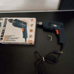 Black & Decker 3/8" (10mm) Variable Speed Screwing Drill, model 7153, in its original packaging. 