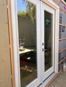 Beautiful NEW wooden French doors