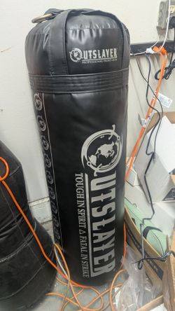 Outslayer 80lb punching bag, Meister Bag hanger with clip, and a pair of 12oz superior boxing gloves.