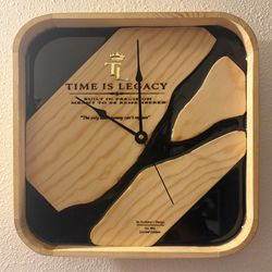 12 x 12 walnut and black epoxy “Time is Legacy” wall clock