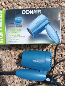 Conair- 1600 watt compact/travel lightblue hair dryer
