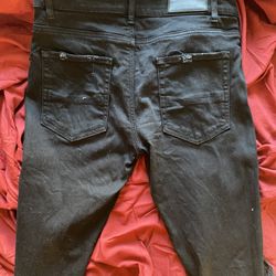 black waxed amiri jeans 