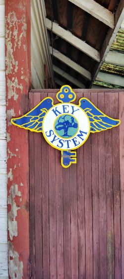Vintage Key System porcelain sign