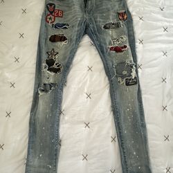 Amiri Original Distressed Patchwork Denim Jean