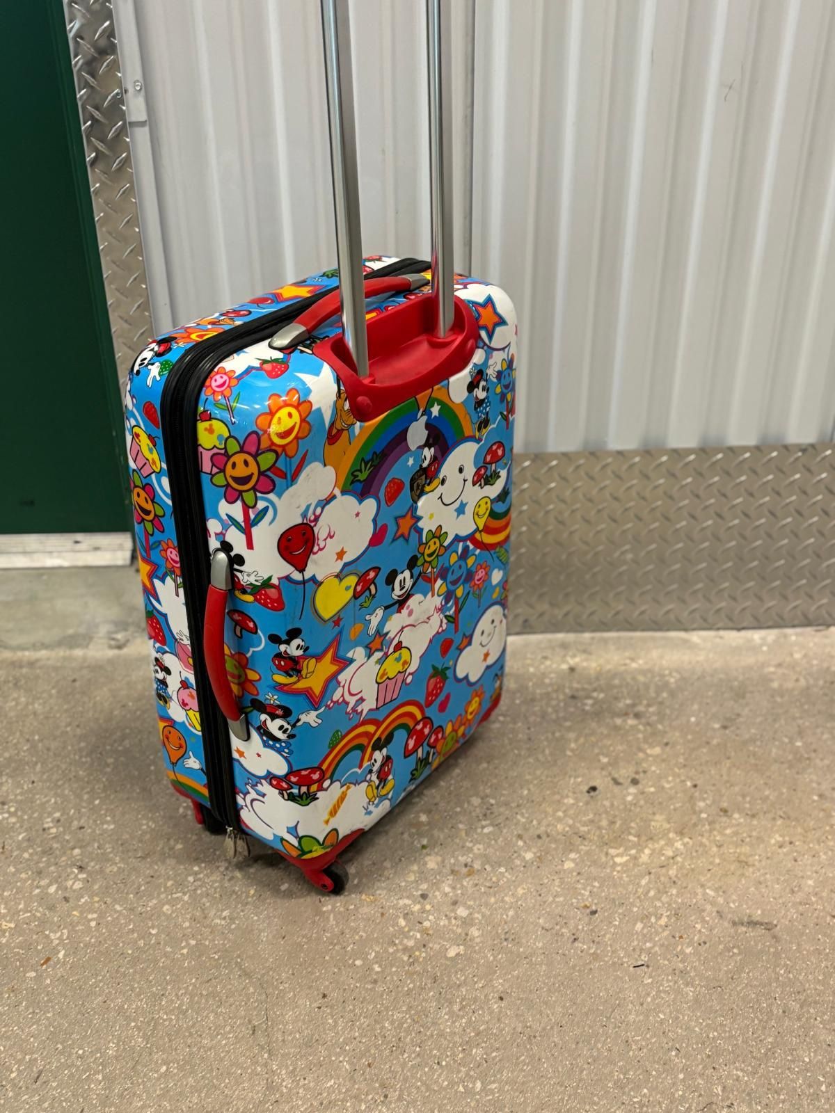 Disney four wheels spinner luggage 26” high … $50