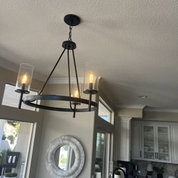 3-Light Matte Black and Chandelier With Clear Glass Shades