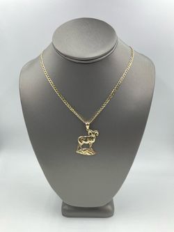 14KT YELLOW GOLD 24” CURB LINK CHAIN 8.8GR W/ 10KT YELLOW GOLD RAM CHARM 4.0GR