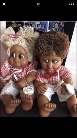 Boy an girl wooden dolls great collection both $60