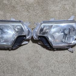 2012-2015 Toyota Tacoma Left and Right Headlights OEM