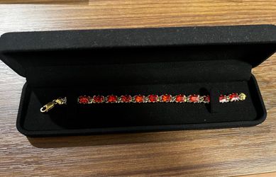 Red Gemstone Tennis Bracelet in Black Jewelry Box