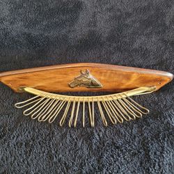 Vintage western tie rack with horse emblem