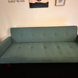 65” Used Turquoise Cloth Futon/Sofa 