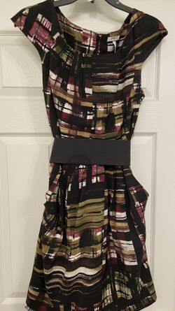 Nice Dress With Belt and Pockets On Each Side  $15.00