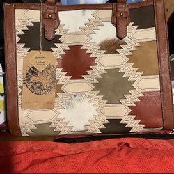 Western styled purse leather with concealed weapon pocket