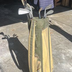 Men’s right, handed golf clubs and bag