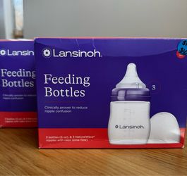 Brand new lansinoh plastic baby bottles (box with 3 bottles, 5 oz)
