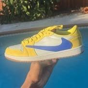 Travis Scott Jordan 1 Low “Yellow Canary”