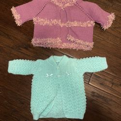 Handmade baby sweaters